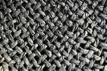 macro black paper hat texture as background, panama hat texture close up, panama hat paper 