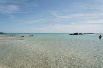 The rocks with people at Elafonissi Beach, Crete, Greece