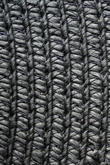 macro black paper hat texture as background, panama hat texture close up, panama hat paper 