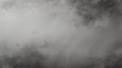 Misty Landscape With Swirling Gray Clouds at Dawn Creates an Atmospheric and Serene Natural Backdrop