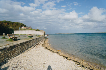 Sea wall at Plage de la Patache in Île de Ré, France,