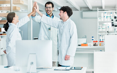 High five, success or happy people with science goals, clinical trial breakthrough or discovery....