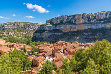 Elevated view of Orbaneja del Castillo, a beautiful Spanish town known for its waterfalls in Burgos Province