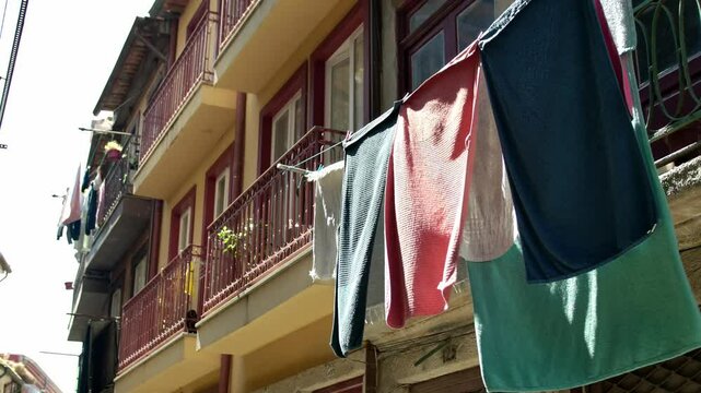 Some laundry hanging for drying on the street of Porto, Portugal.