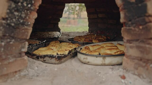 Chipa and Paraguayan soup baking in the hot tatakua. Chipa and Paraguayan soup are traditional and typical foods in Paraguay, usually made during Holy Week