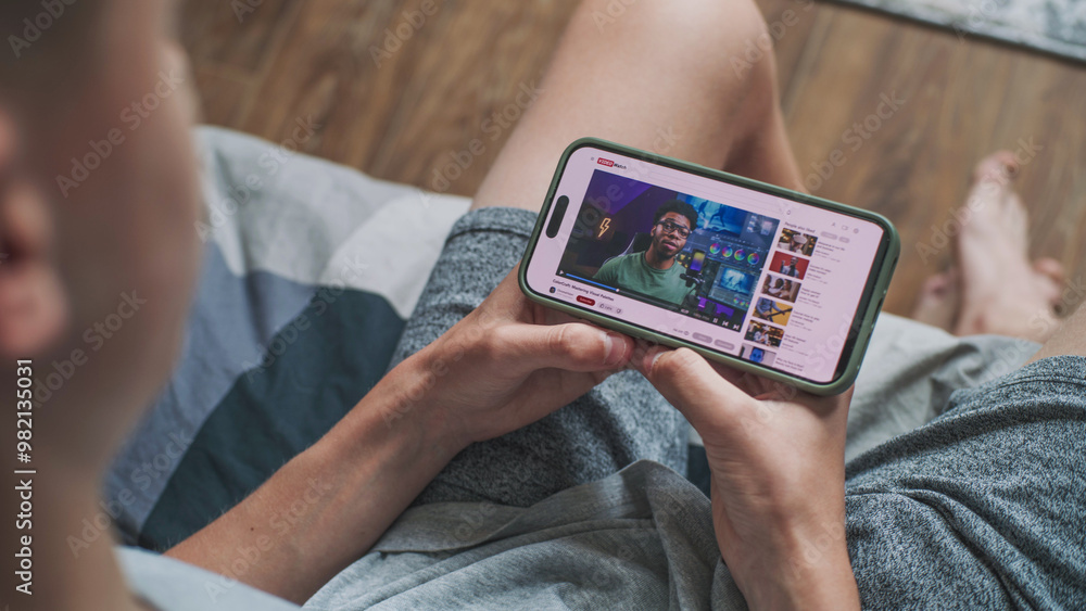 Poster video sharing platform with blogger content about color correction displayed on smartphone screen. c