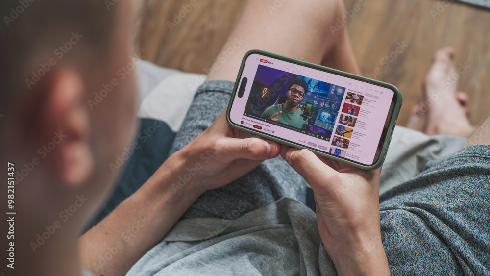 Poster video sharing platform with blogger content about color correction displayed on smartphone screen. c