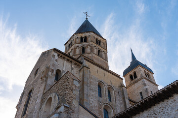 Majestic Abbey of Cluny with Romanesque towers and stone facades in Burgundy, France