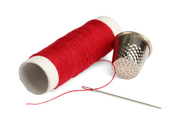 Thimble and needle with red sewing thread isolated on white