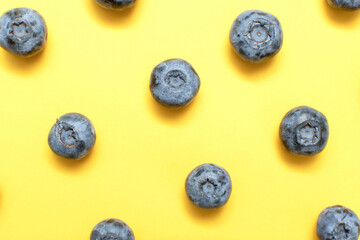 Fresh blueberry on yellow background	