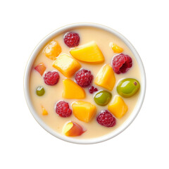 A bowl of fresh fruit salad featuring peaches, raspberries, and grapes in a creamy base, isolated on a white background