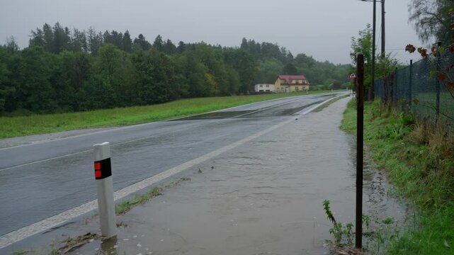 Pan wide shot of flooded road