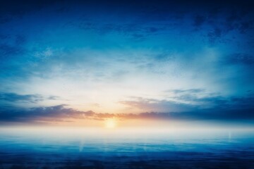 Obraz premium A stunning sunset over the ocean horizon with a soft gradient sky and calm water, perfect for travel, nature, or relaxation-themed designs. 