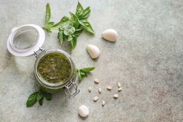 Jar with fresh homemade pesto sauce