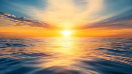 Obraz premium A stunning sunset reflecting on the tranquil ocean surface, showcasing vibrant colors and serene beauty of nature.