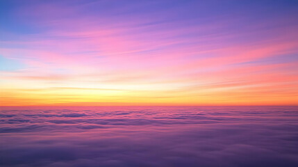 Fototapeta premium Stunning View of Colorful Sunset Above a Sea of Clouds, Captured from Above
