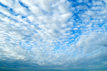 Blue early morning sky landscape with white clouds in the vast morning sky. Morning blue sky...