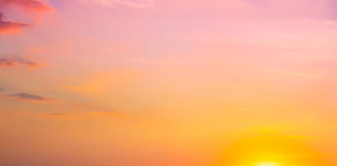 Enjoy a panoramic view of the skyline. The sun rises in the morning sky with colorful clouds. and beautiful cloud patterns In the soft light of the morning	