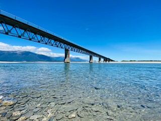 Scenic spot at Haast River Bridge, one lane bridge in Haast, West coast, South Island, New Zealand. Bridge over the river