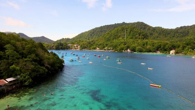 Docked Motorboats Awaiting Adventure by the Emerald Shore