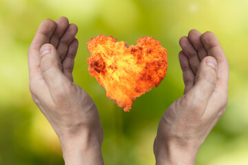 Fire heart in the hand