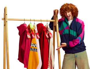 Stylish savings. Shopper posing next to colorful selection of clothes, all marked with big discounts against transparent background. Concept of Black Friday, Cyber Monday, fashion, Flash Sale. Ad