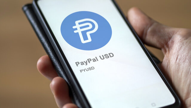 PYUSD, PayPal USD on the screen of an exchange. PYUSD Pay Pal USD price stocks, $PYUSD on a device.
