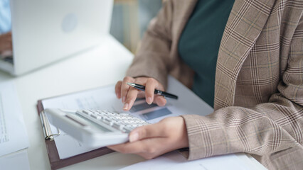 business man Auditor or internal revenue service staff checking annual financial statements company Audit  Accounting tax.
