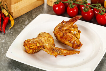 Tasty roasted chicken wing with spices