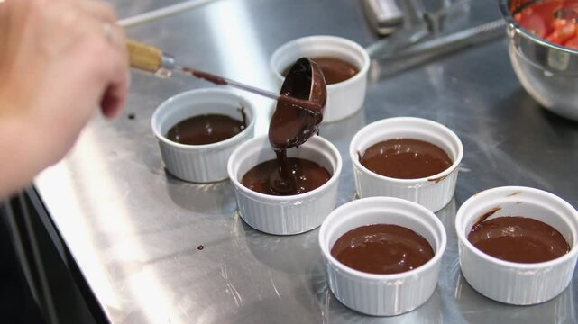 pour fondant into molds Cooking chocolate fondant, pouring into molds, process