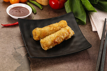 Vietnamese stuffed spring roll served sauce