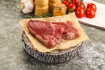 Raw marble uncooked beef steak