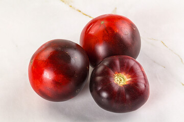 Black ripe juicy organic tomato