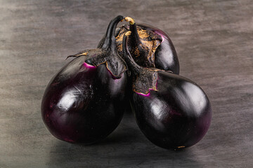 Raw violet and black eggplant