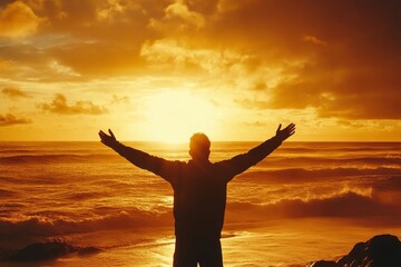 Man Welcoming the Sunset on the Beach