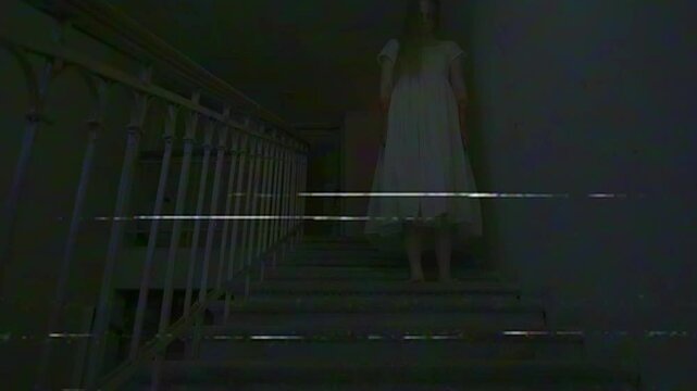 Creepy ghost woman in white dress alone dead walking down the staircase in dark haunted house, glitch video effect. Halloween horror advertisement concept.