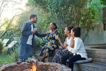 Friends�hanging out by fire pit