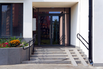 Front Steps and Doors of Entrance to Modern Building.