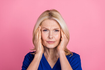 Photo portrait of lovely pensioner lady touch temples suffer headache dressed stylish blue garment...