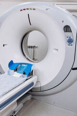 A medical CT or MRI machine is located in a diagnostic clinic, showcasing advanced imaging...