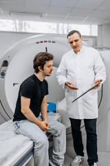A dedicated doctor completes an MRI examination while engaging with a patient. This image showcases...