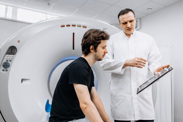 After the MRI procedure, the patient receives doctor's recommendations. MRI scanner capsule. The...
