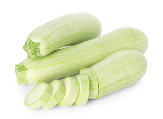 Fresh whole and cut zucchinis isolated on white, above view