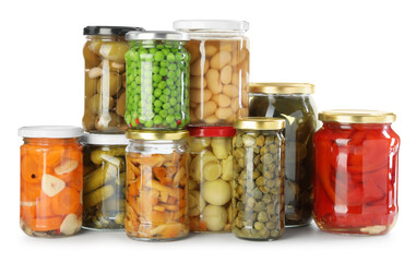 Different pickled products in jars isolated on white