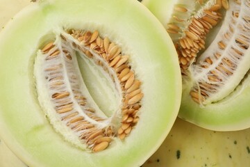 Fresh ripe honeydew melons as background, closeup