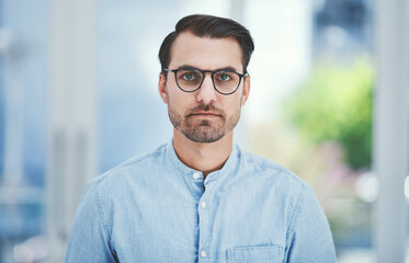 Naklejka premium Eye care, optometry portrait and man with glasses at optical office for designer frame or prescription lens. Confident customer, person or new spectacles at vision consultation for wellness or health