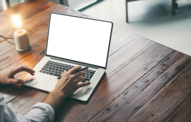 Close up of male hands and laptop with blank screen. Mock-up of computer monitor. Copyspace ready for design or text. Transparent screen, cut out. PNG