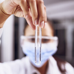 Scientist woman, test tube and medical liquid closeup in lab with research, mask and monkeypox vaccine. Hospital, job and science vial for chemistry investigation and work on disease cure at clinic