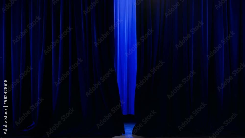 Poster the curtain is set in a dark blue shade, draping elegantly to form a backdrop for an upcoming perfor