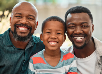 Happy, black family and portrait with men for generation, youth development or father and son time in backyard. Young African, dad and grandpa with smile in joy for aging, memory or growth in Nigeria